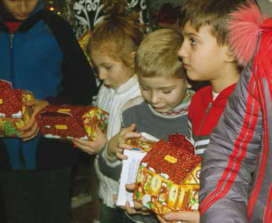 GCM Ministries brought gifts for the children. Candy was a special treat. The local village store does not have provisions for children.