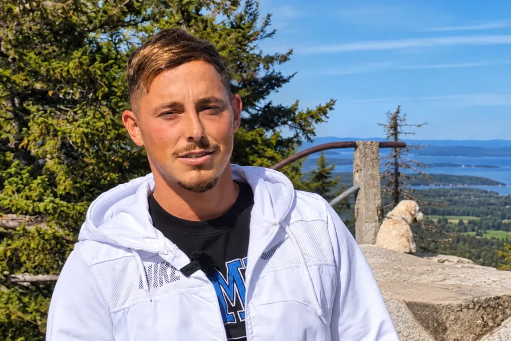 Daniel, a survivor of the October 7 Supernova music festival attack, photographed outdoors.