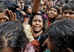 Crowd of people gathered closely together during a crisis in Nepal